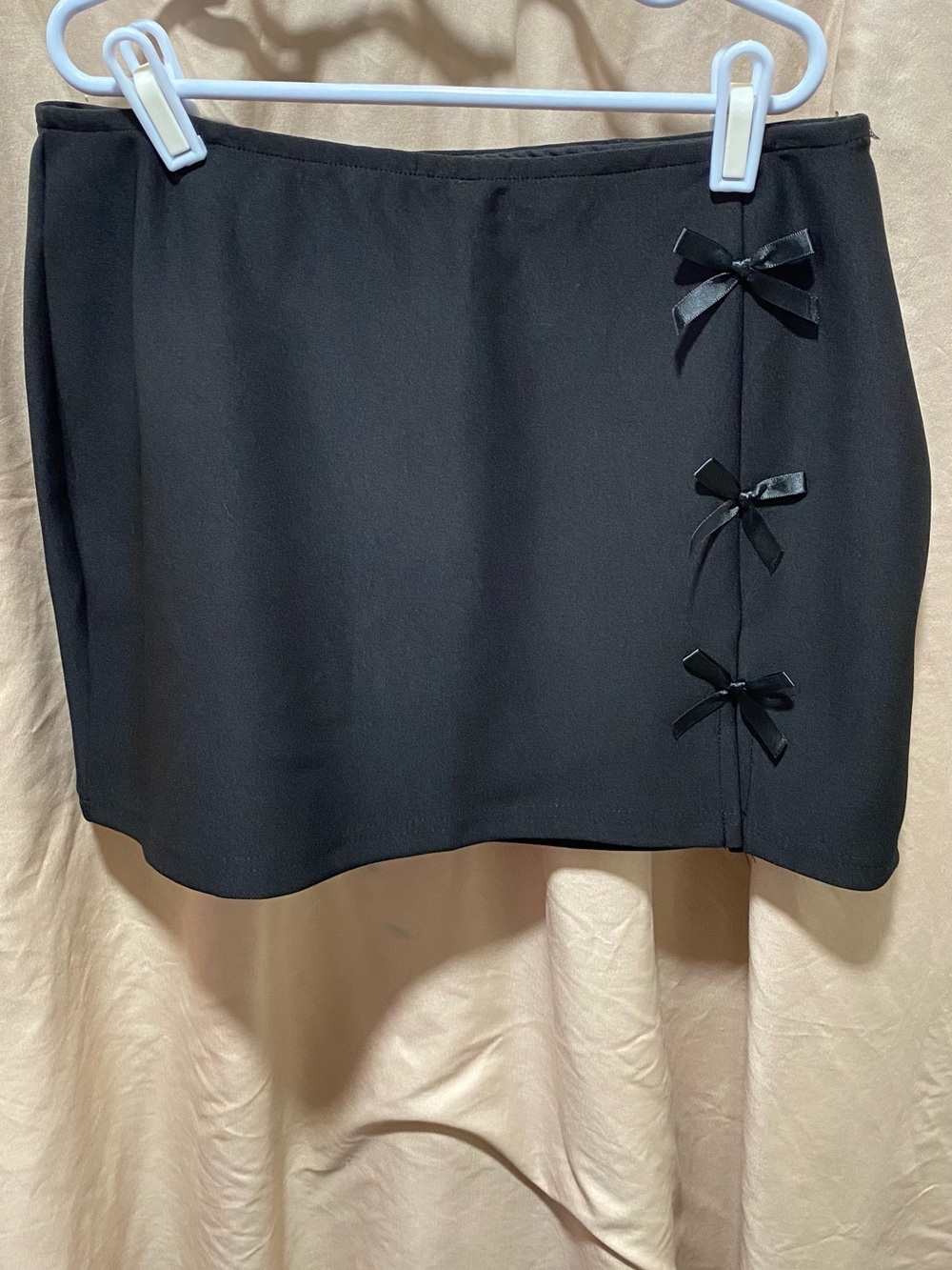 Black Mini Skirt with Decorative Bows